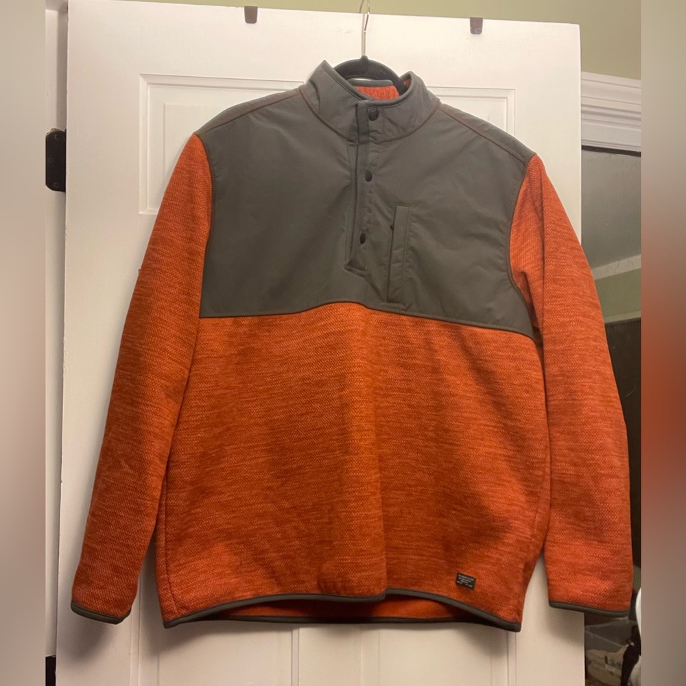 Pullover that can be used year round on its own or as a layer.